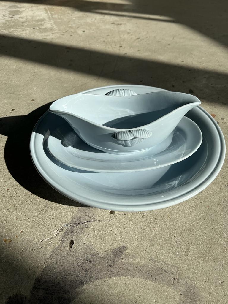 Flat set and light blue saucière earthenware from Montereau