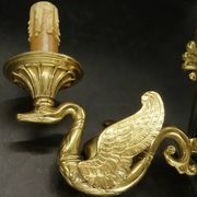 Pair of Empire style wall sconces with swans by Petitot - bronze & green patina