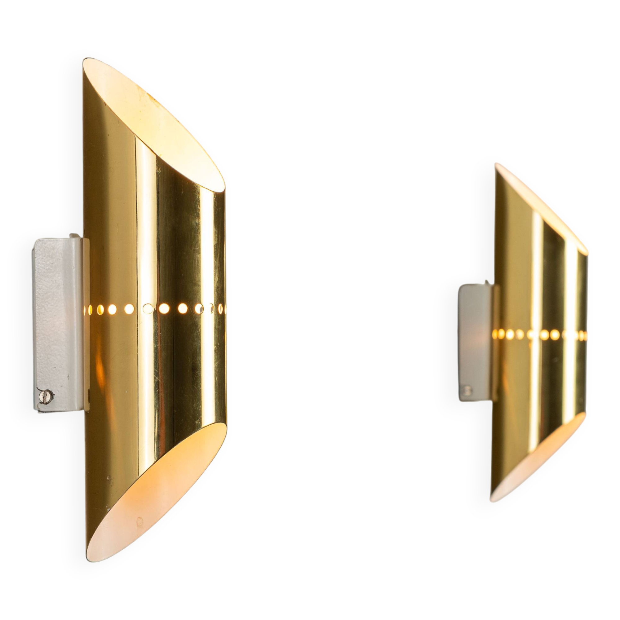 Pair of cylindrical wall lamps in brass with perforated shades