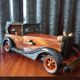 Toy car made of varnished wood