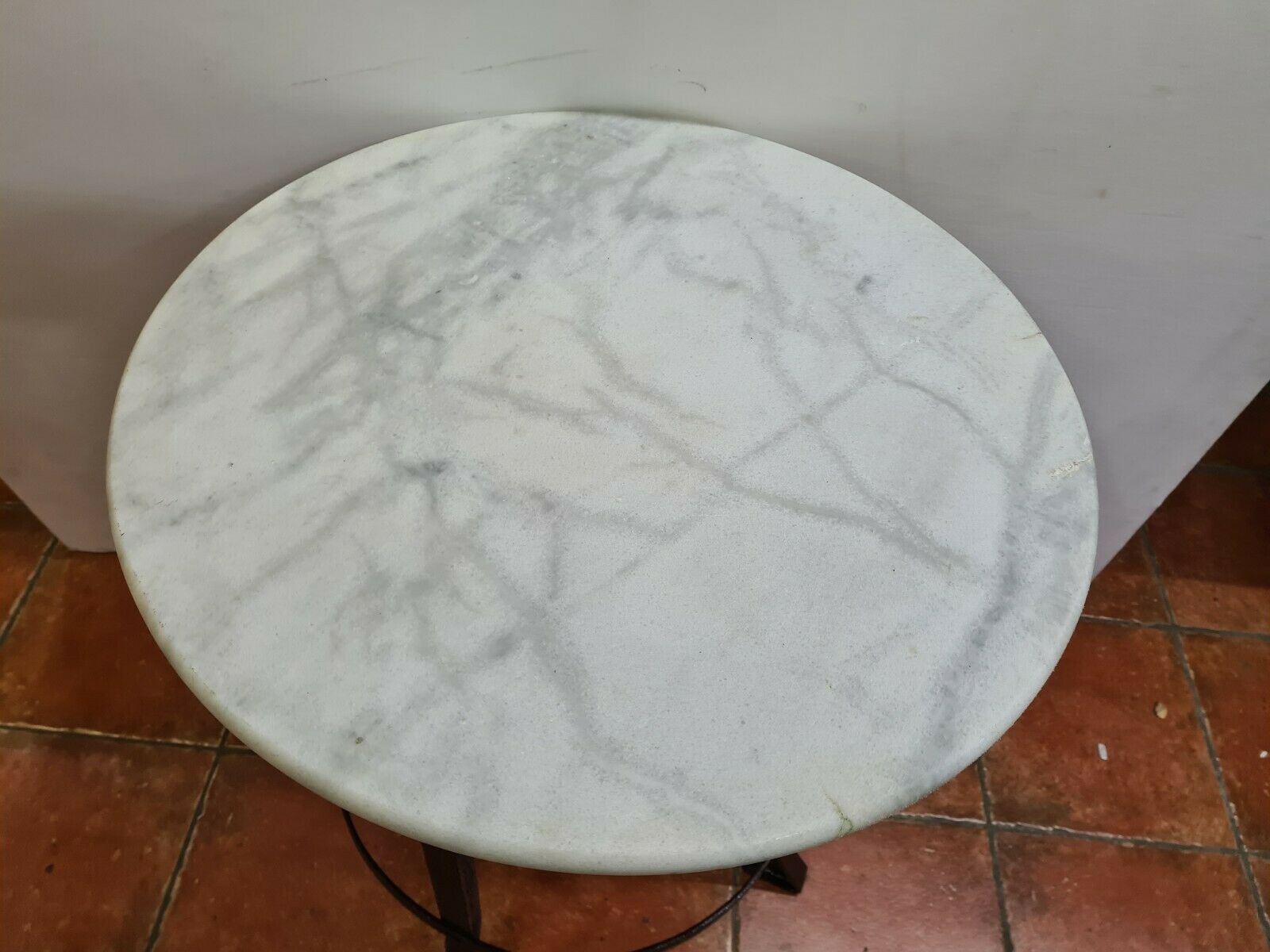 Iron pedestal table and marble top