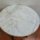 Iron pedestal table and marble top