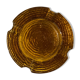 Empty chiseled pocket in amber glass