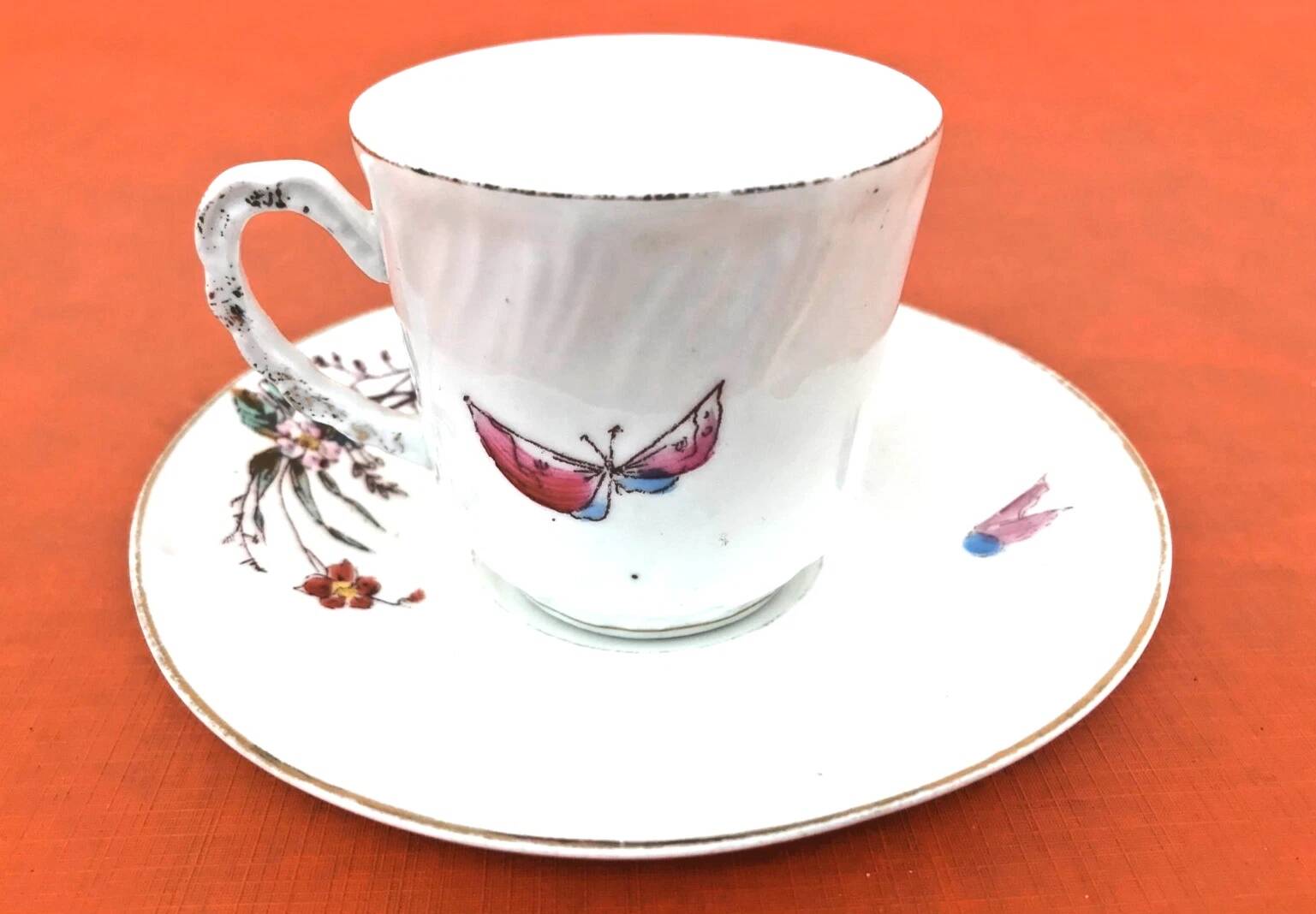 Old coffee cup / saucer in porcelain