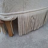 "Crapaud" bench in the richly decorated Napoleon III style.