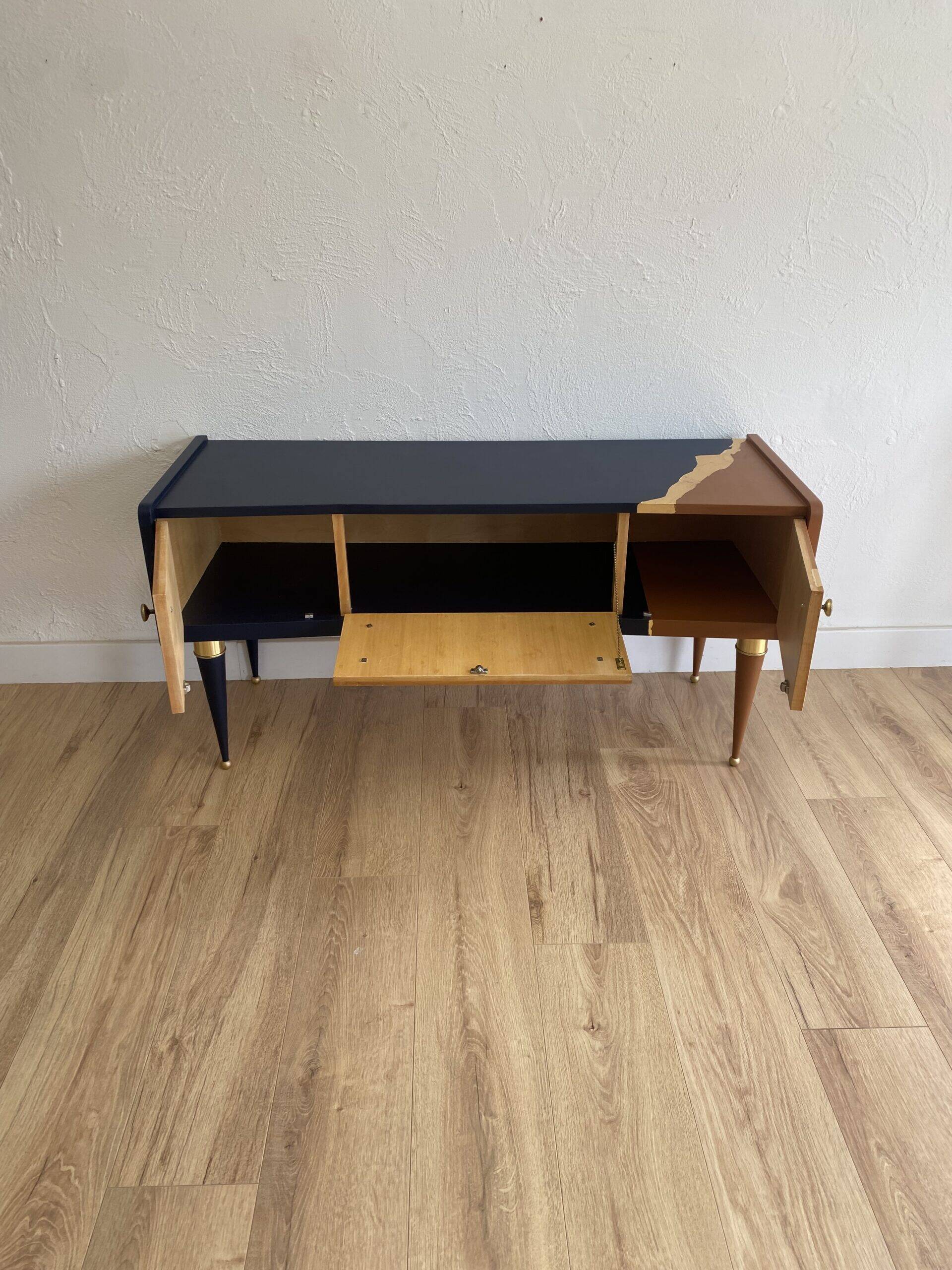 Vintage furniture revamped in navy blue, terracotta, and gold leaf – Reimagined mid-century style.