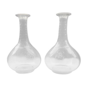 Pair of crystal decanters with cut collar and engraved body with R monograms