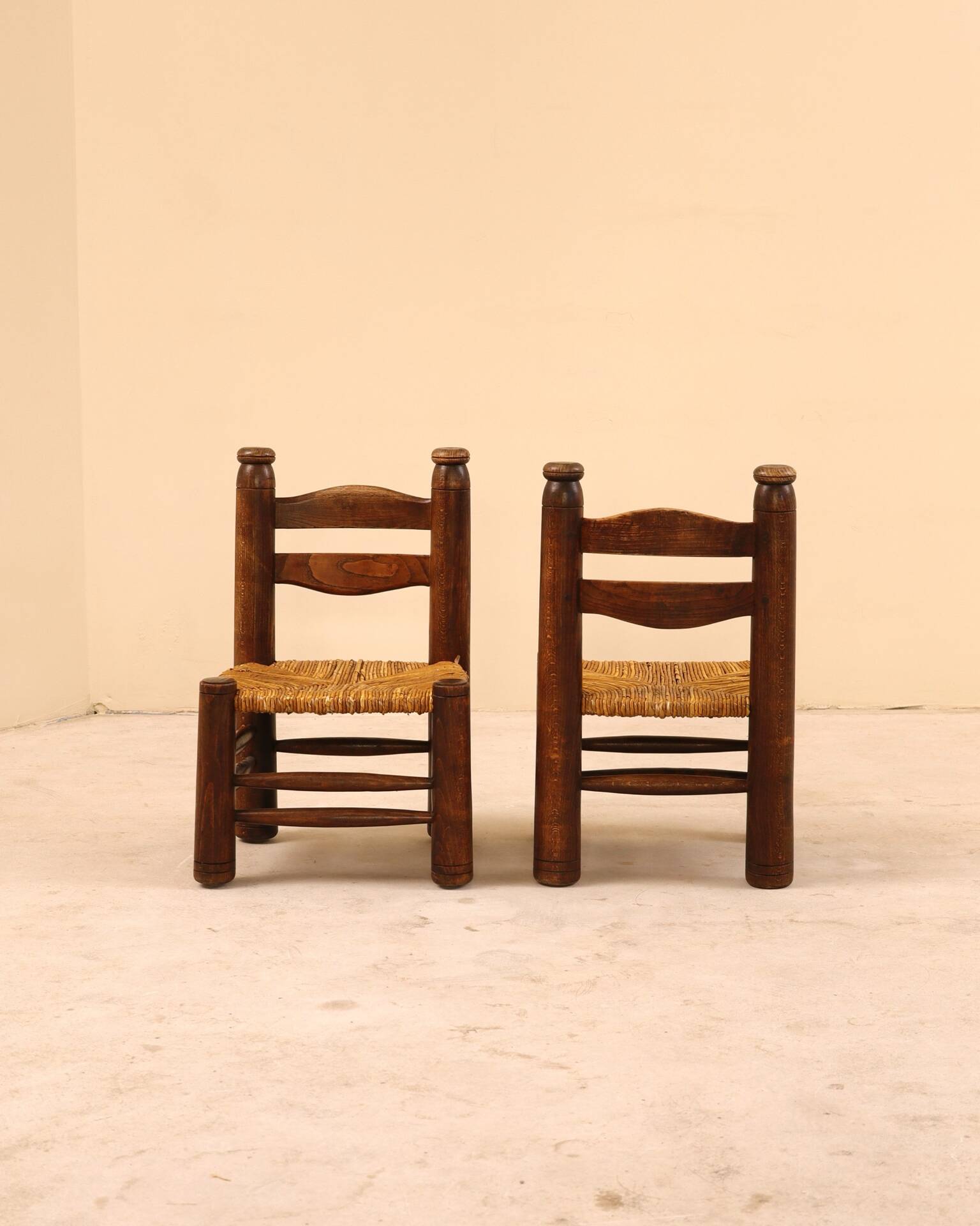 Low fireplace chair attributed to Charles Dudouyt.
