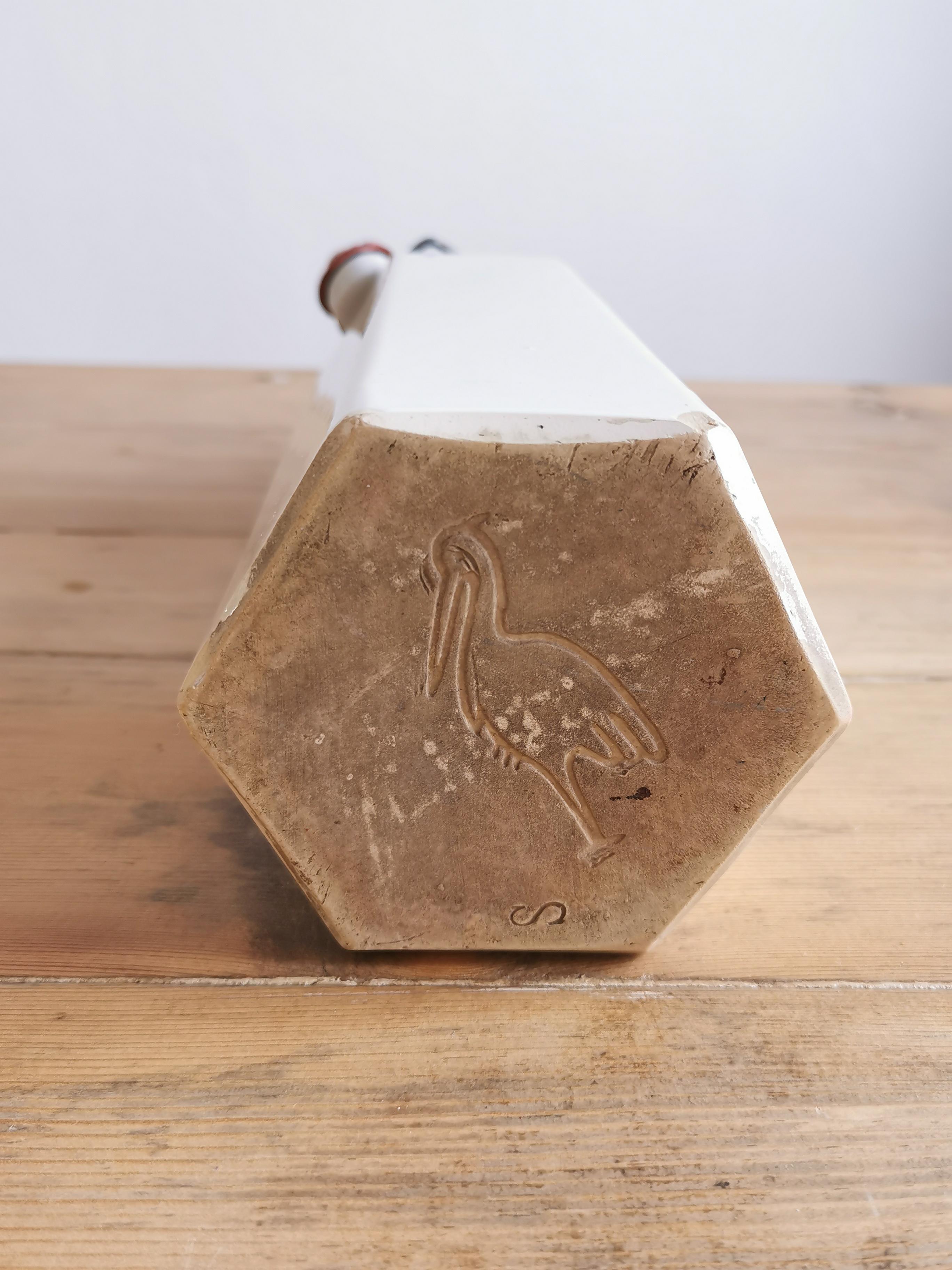 Hexagonal sandstone bottle