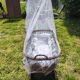 Vintage wicker cradle/pram on wheels