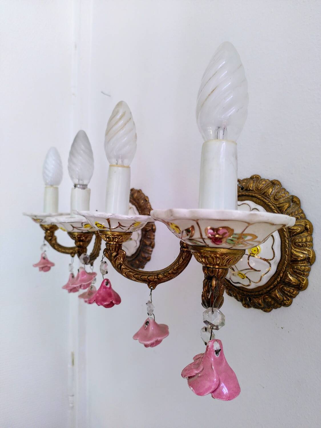 Pair of brass and porcelain wall lights