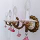 Pair of brass and porcelain wall lights