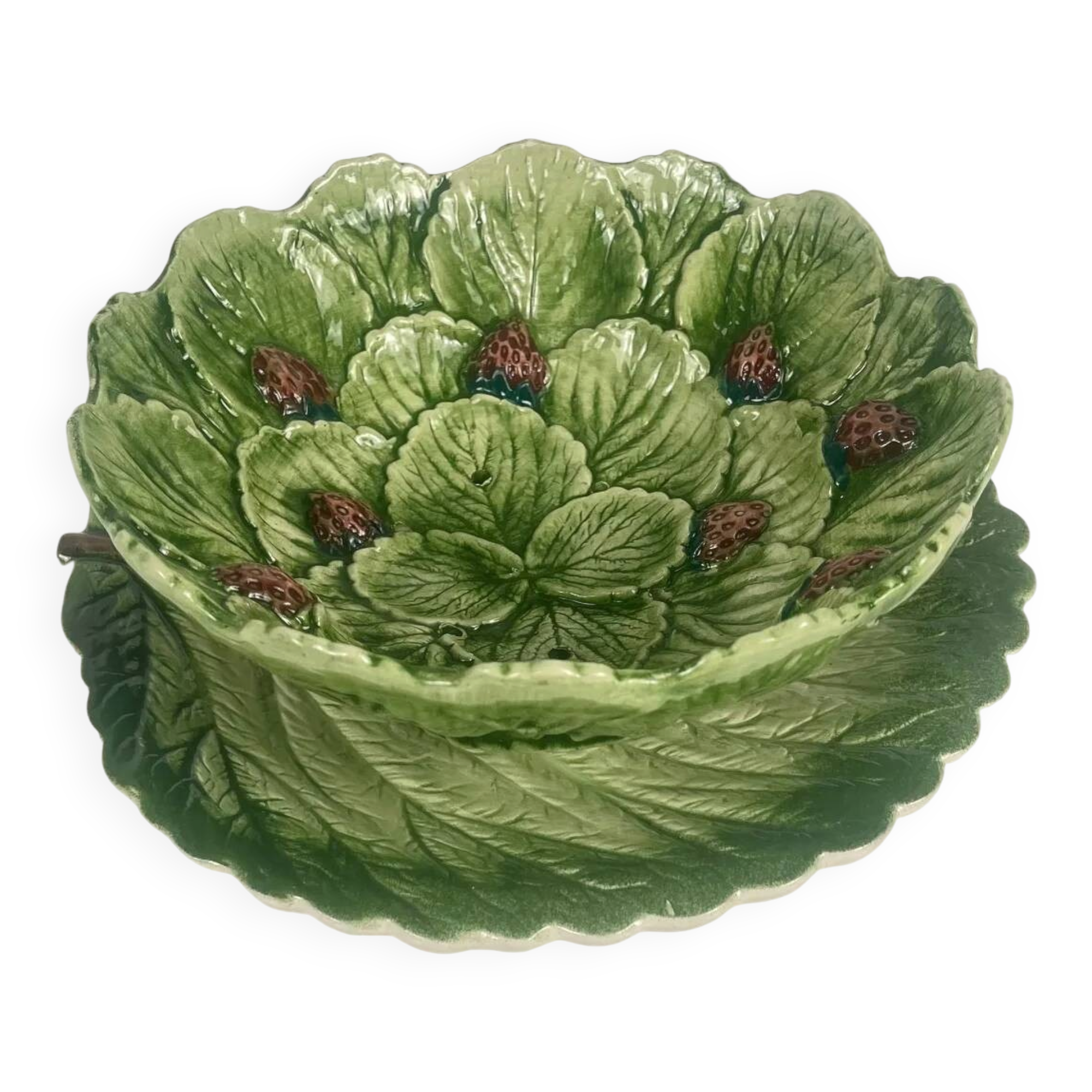 Leaf and strawberry-shaped bowl/strainer.