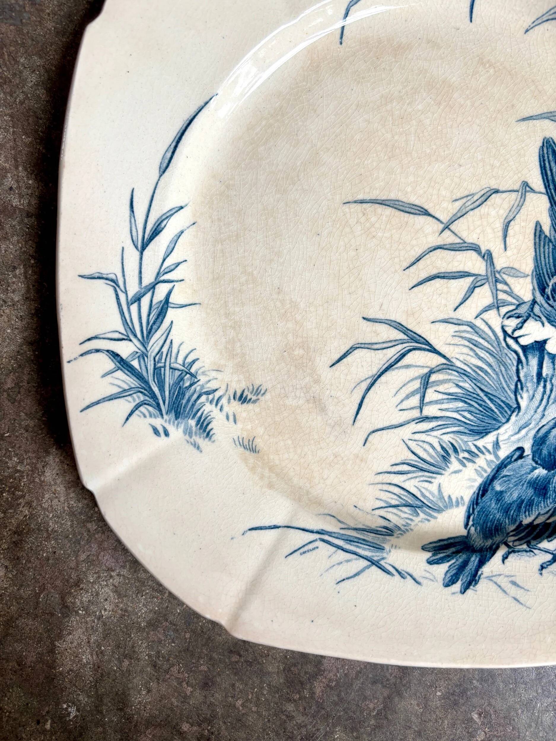 Blue ironstone plate from Gien, "Birds" service, circa 1870, no. 5.