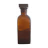 Amber liqueur bottle with wooden cap
