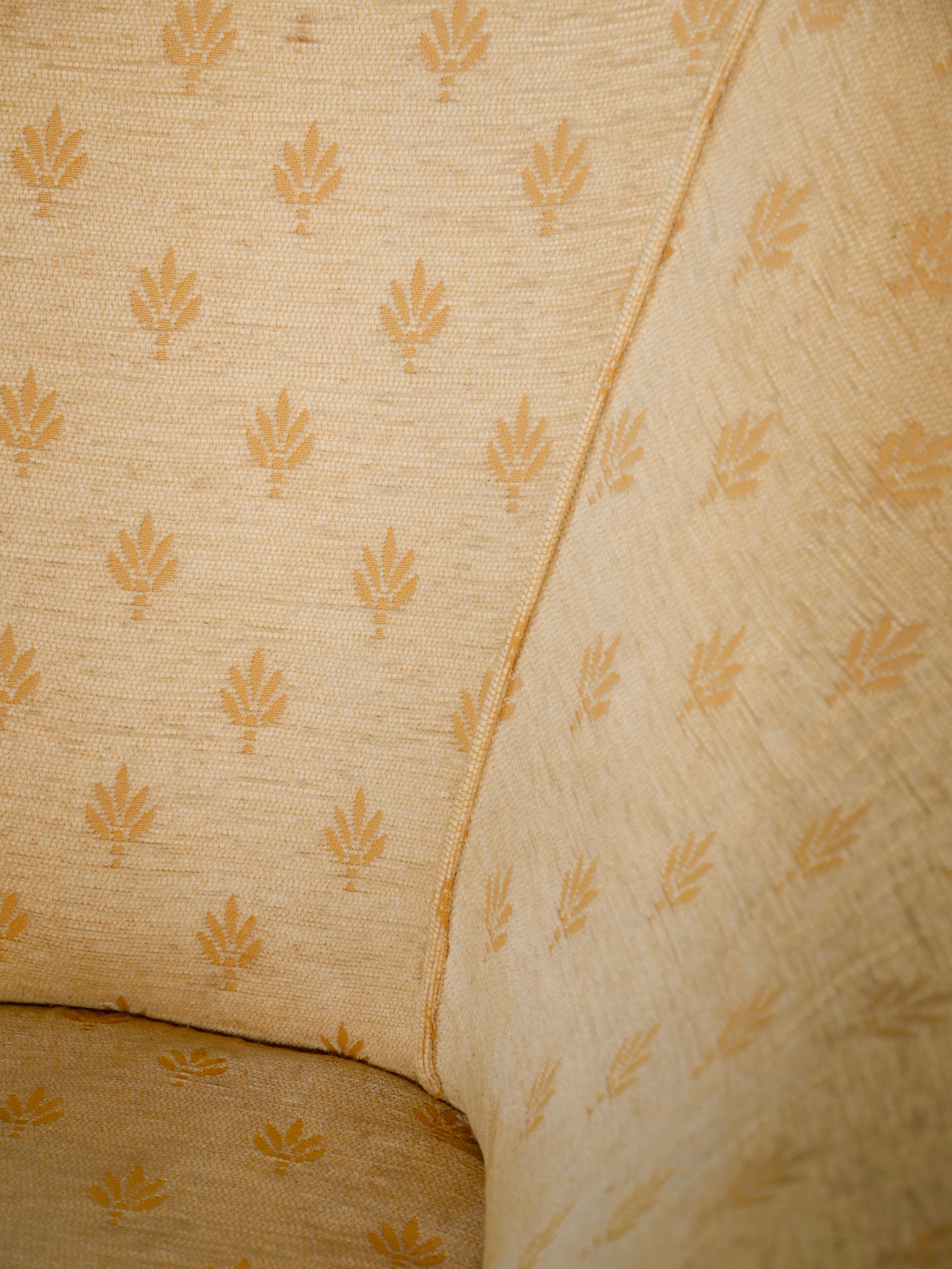 Pair of yellow vintage armchairs