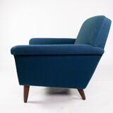 Armchair upholstered with dark blue wool fabric and legs in dark wood, of danish design, 1960s