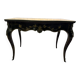 Table console de style Louis XV en bois noirci.
