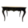 Table console de style Louis XV en bois noirci.