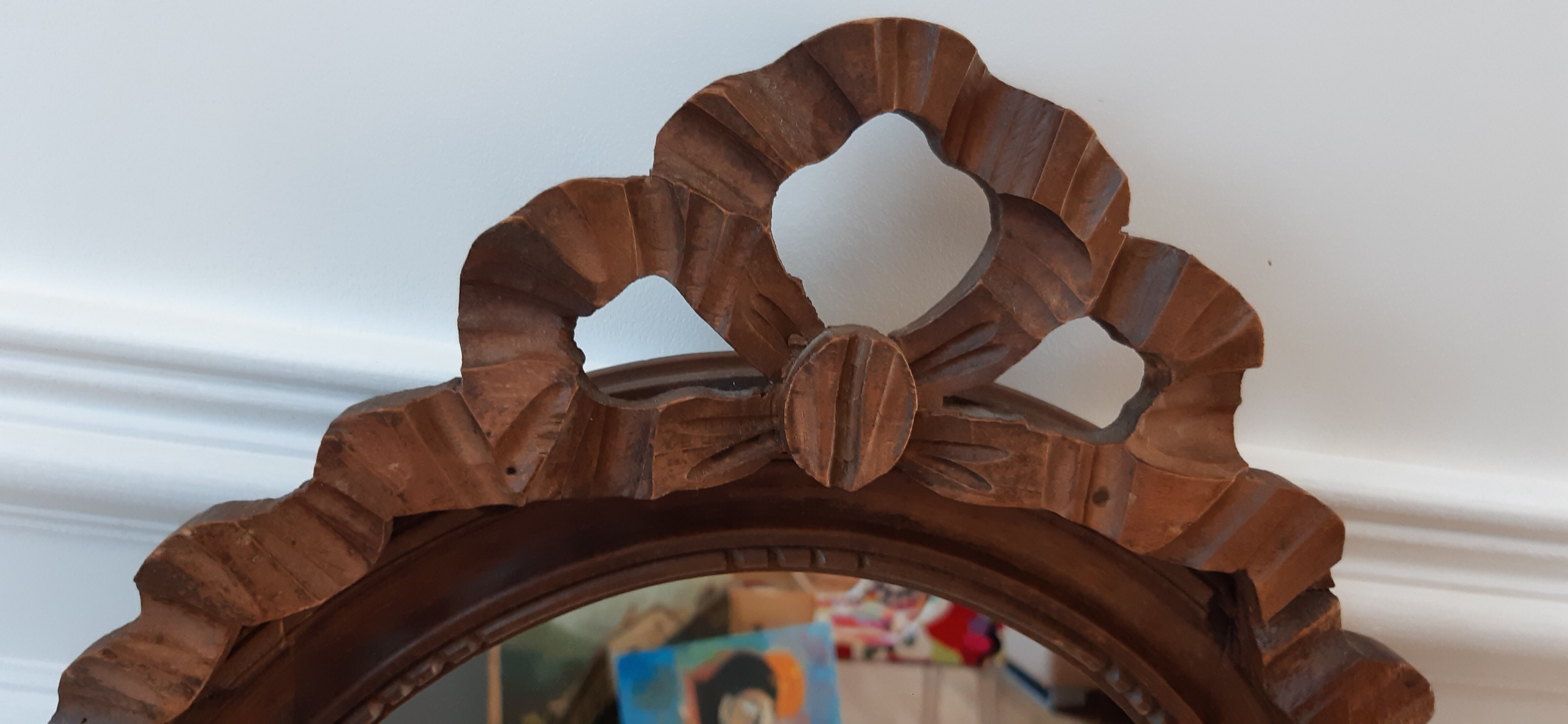Miroir en bois oval années 30