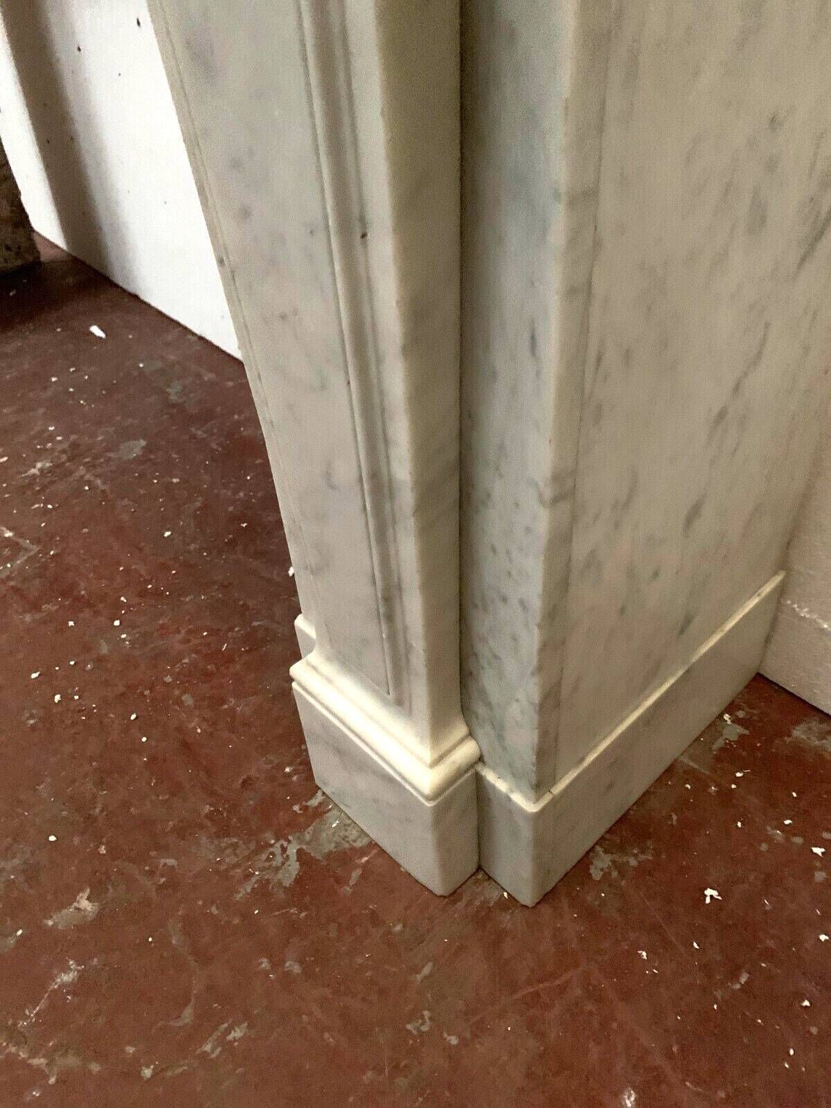 Regency style fireplace in white Carrara marble, Italy, 19th century.
