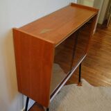 Small window on high metal feet