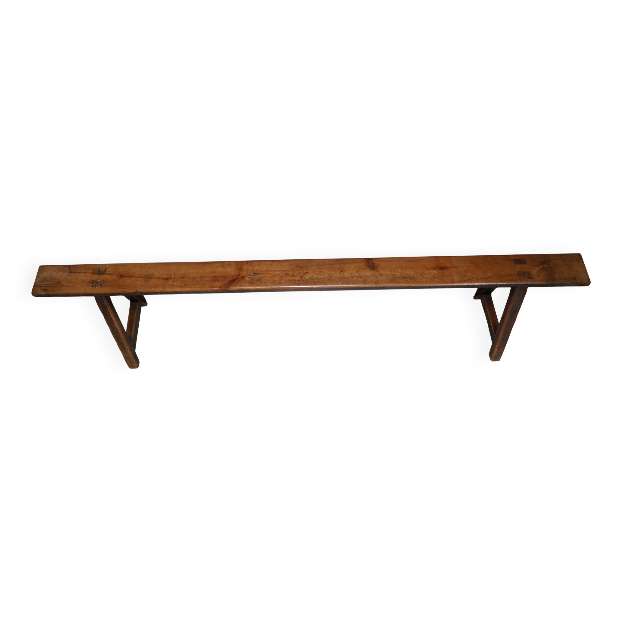 Pair of antique Victorian trestle benches in fruitwood.