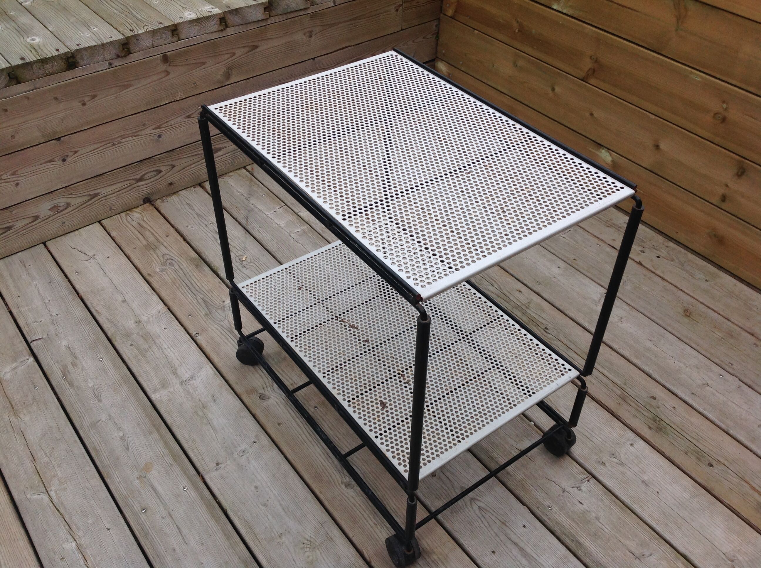 Perforated iron rolling table