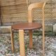 Pair of chairs by Swiss designer Bruno Rey in wood and brown skai
