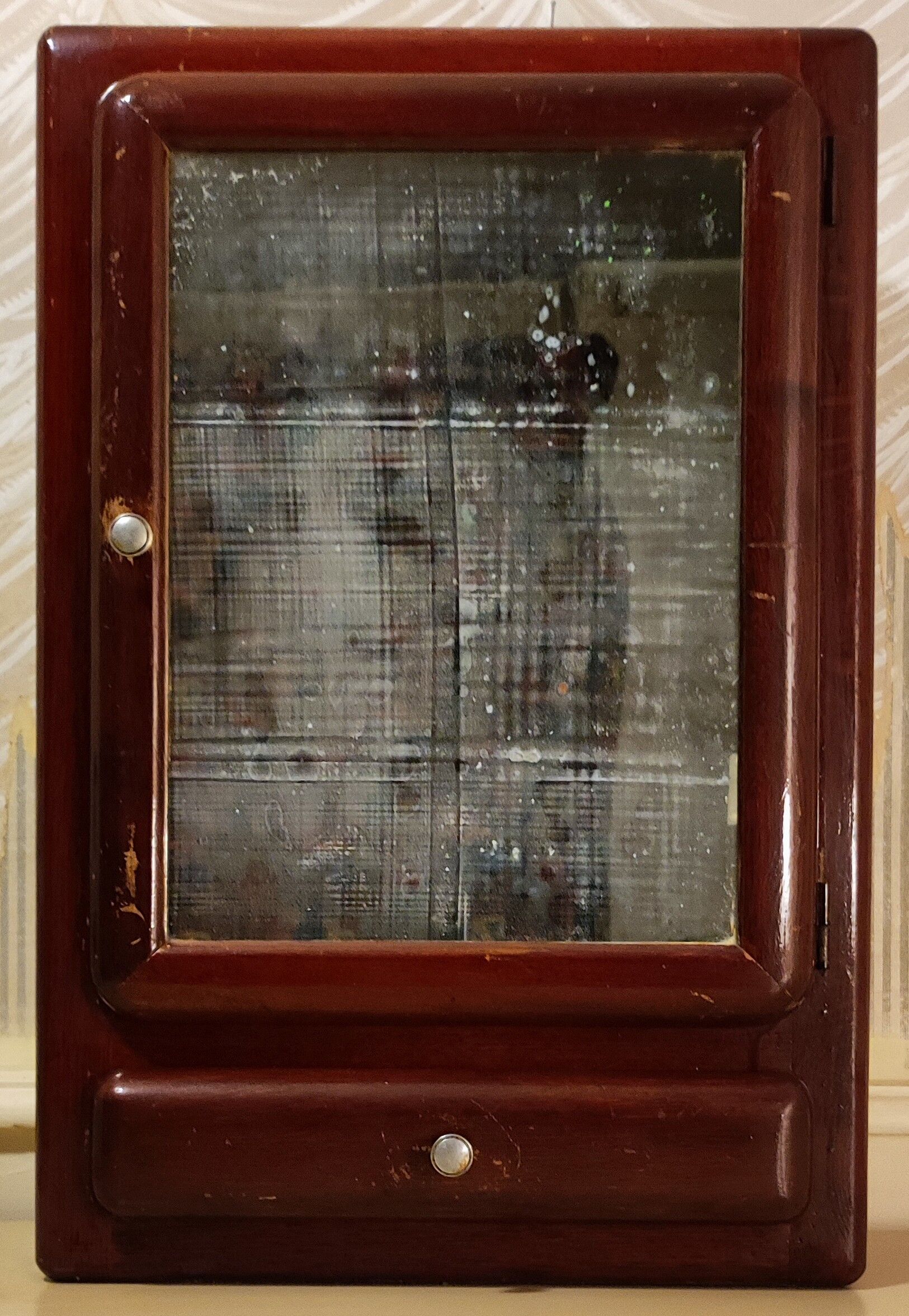 Wall-mounted medicine cabinet circa 1940