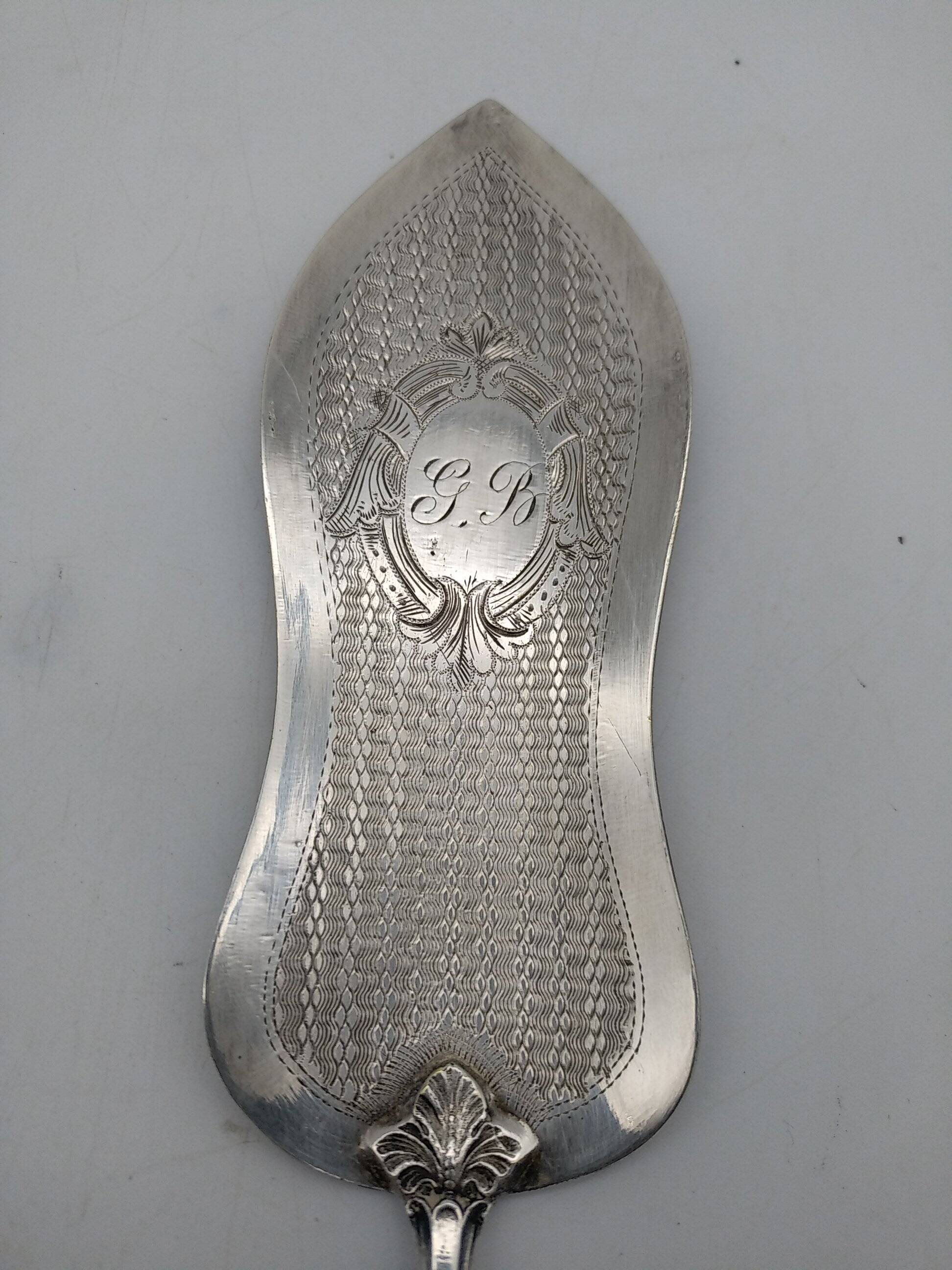 Silver and silver-filled pie server. 19th century.