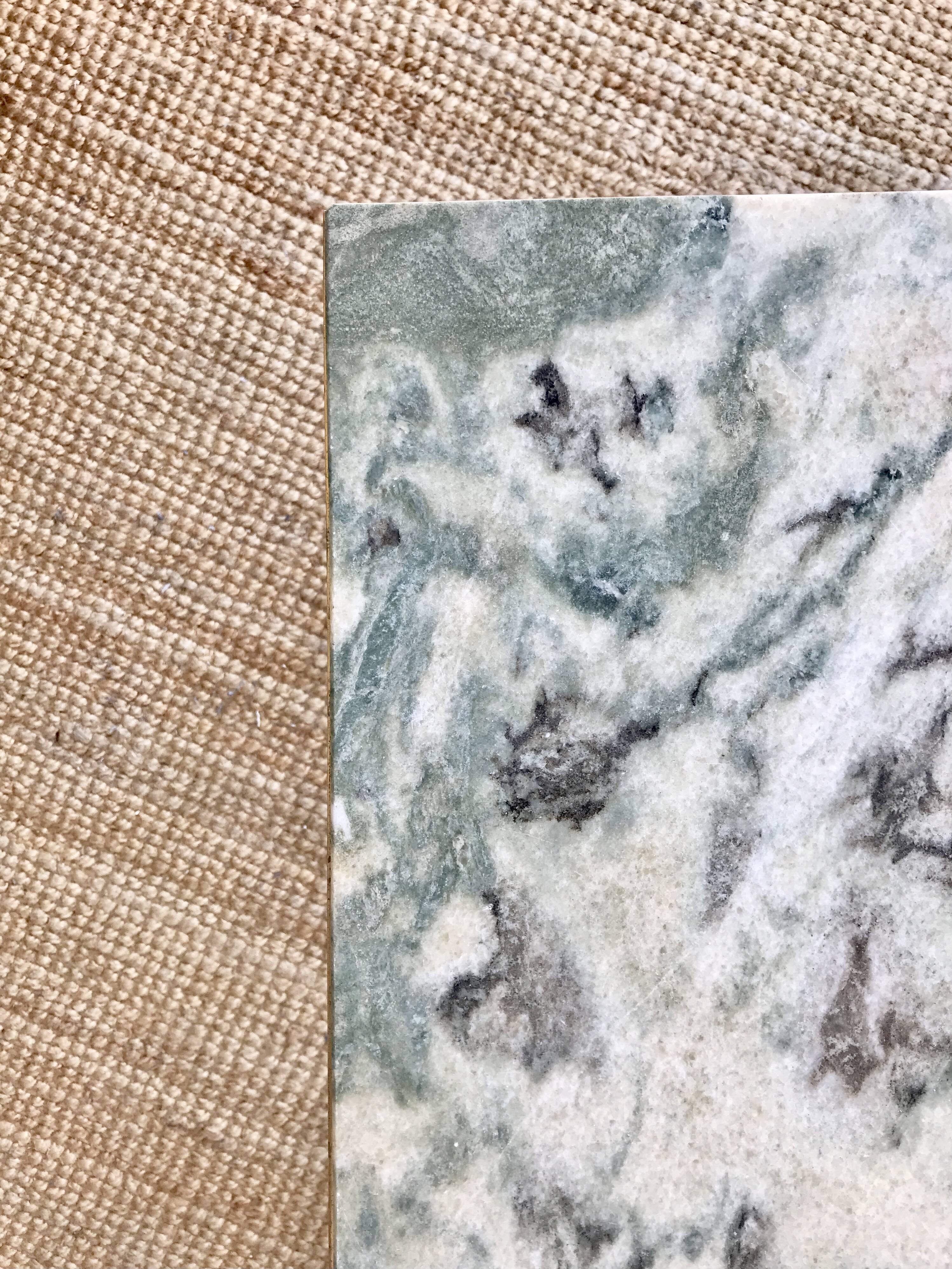 Coffee table in brass and green marble