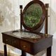 Empire hairdresser from the 19th century in mahogany with a marble top.