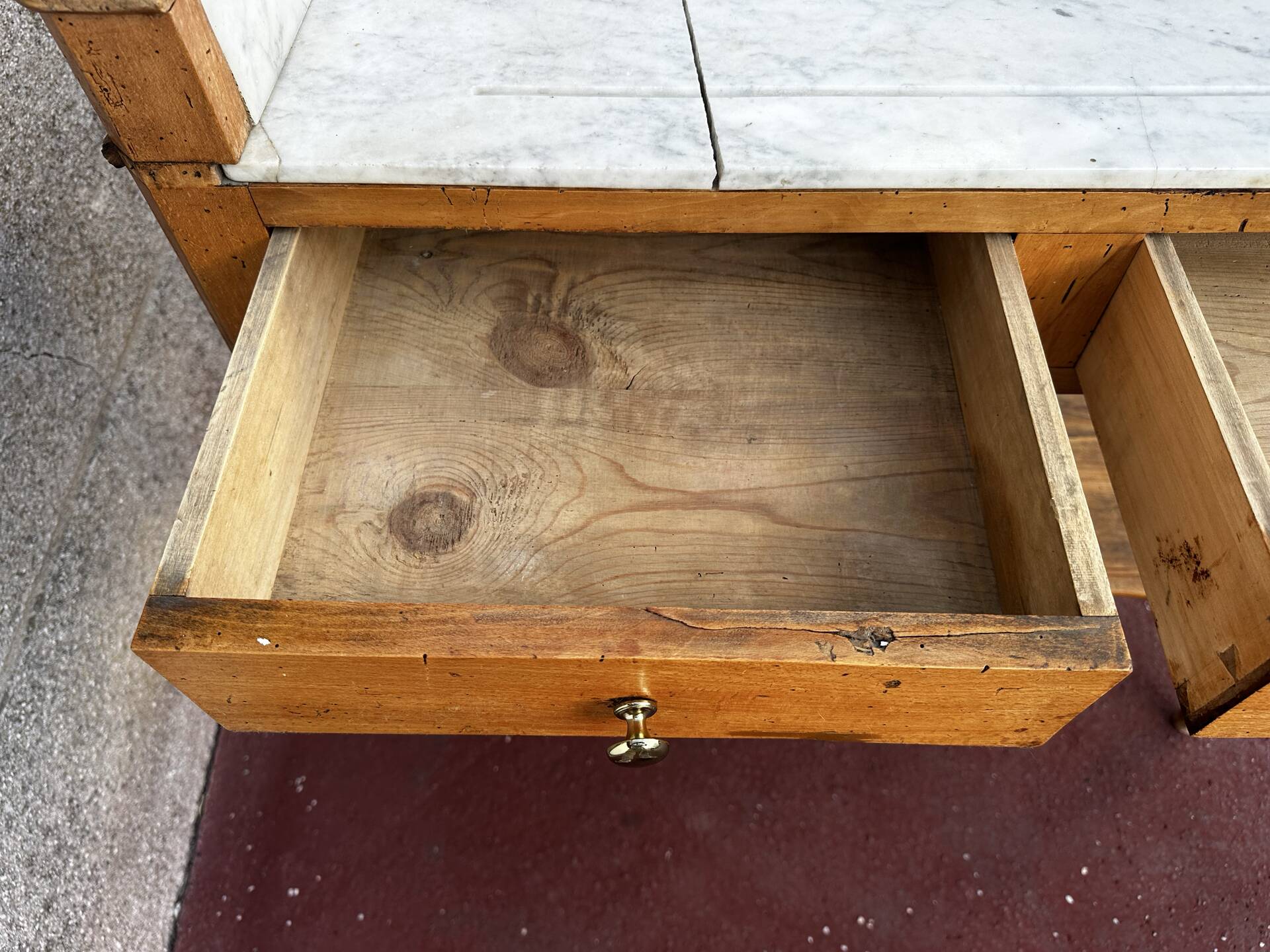 Walnut and marble dressing table, mercury mirror, circa 1850.
