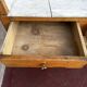 Walnut and marble dressing table, mercury mirror, circa 1850.