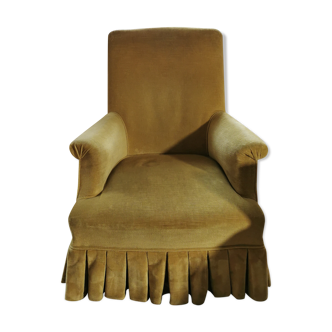 Folded ochre velvet toad armchair
