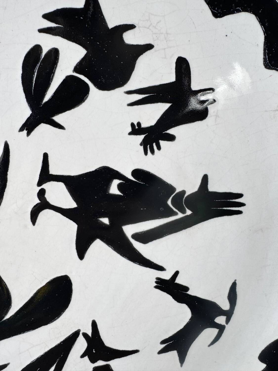 Large ceramic plate J. Lurçat with zoomorphic decoration in black on a white background.