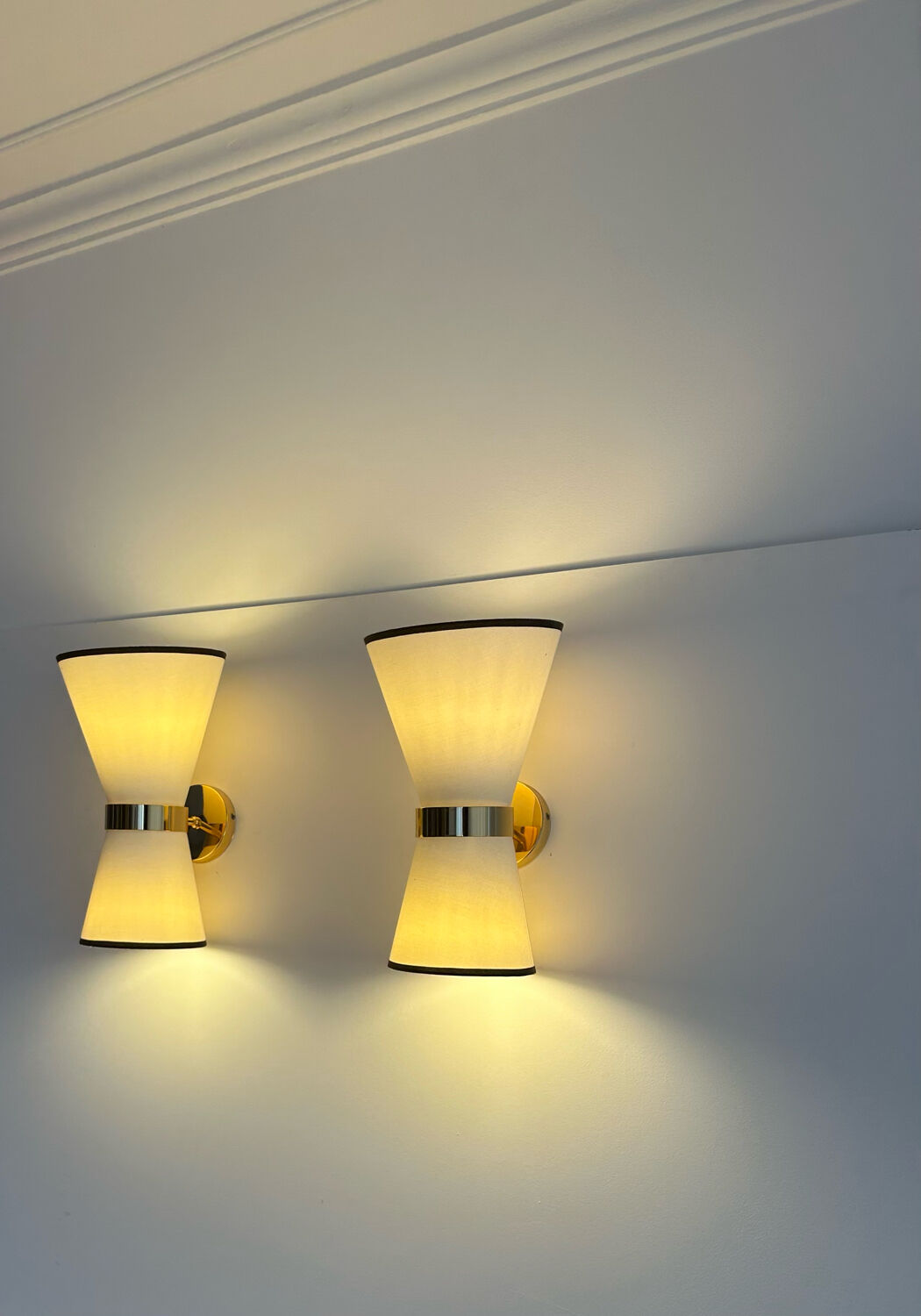 Pair of vintage wall lamps, brass and unbleached fabric, Italy 1980