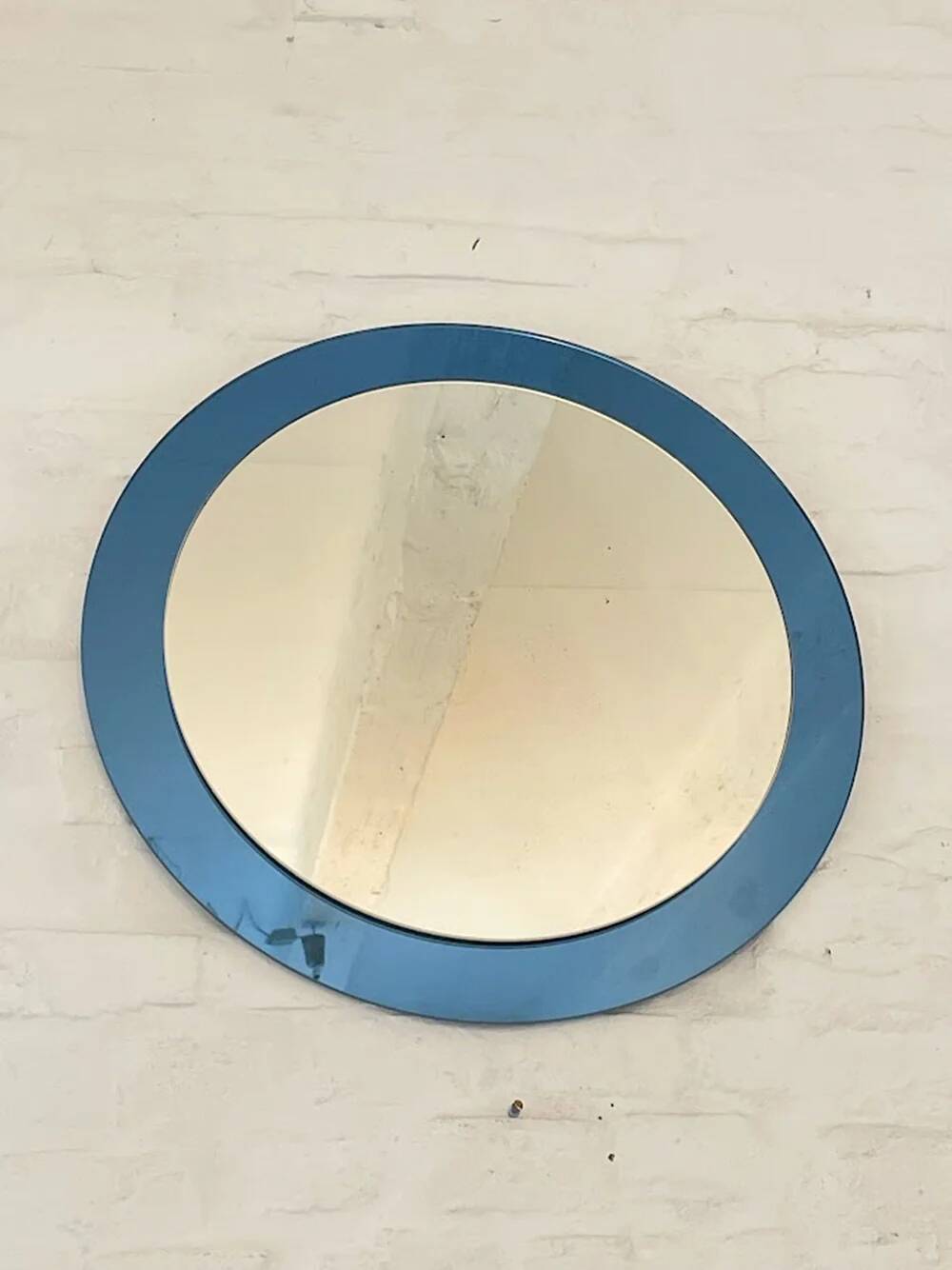 Blue glass wall mirror, Italian, circa 1960s-1970s.