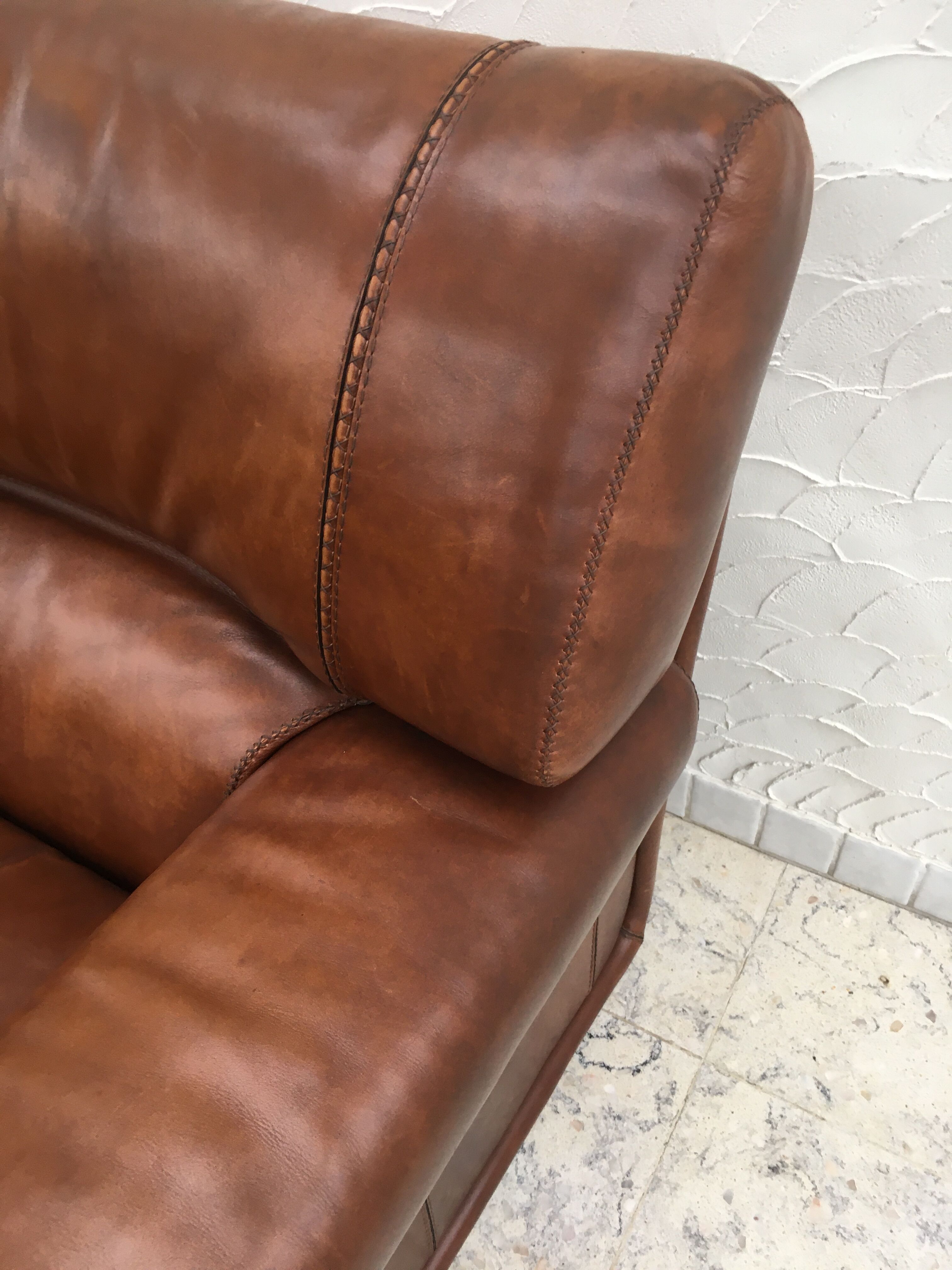 Sofa and leather armchair