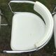Fauteuils vintage à piétement tubulaire chromé et Skaï blanc de Renato Zevi pour Roche bobois.