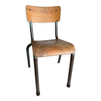 Old wooden and metal children's school chair