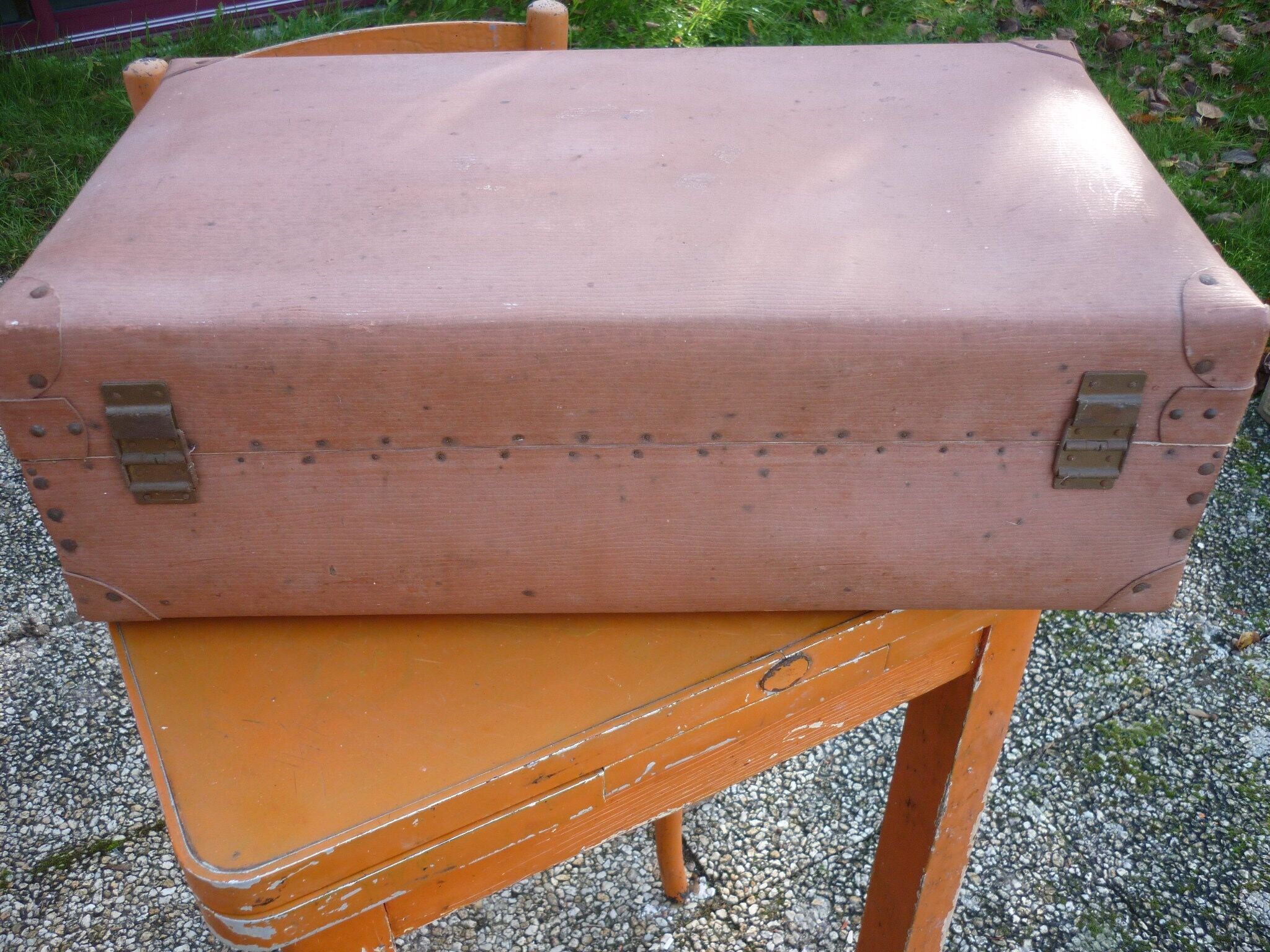 Green cardboard suitcase