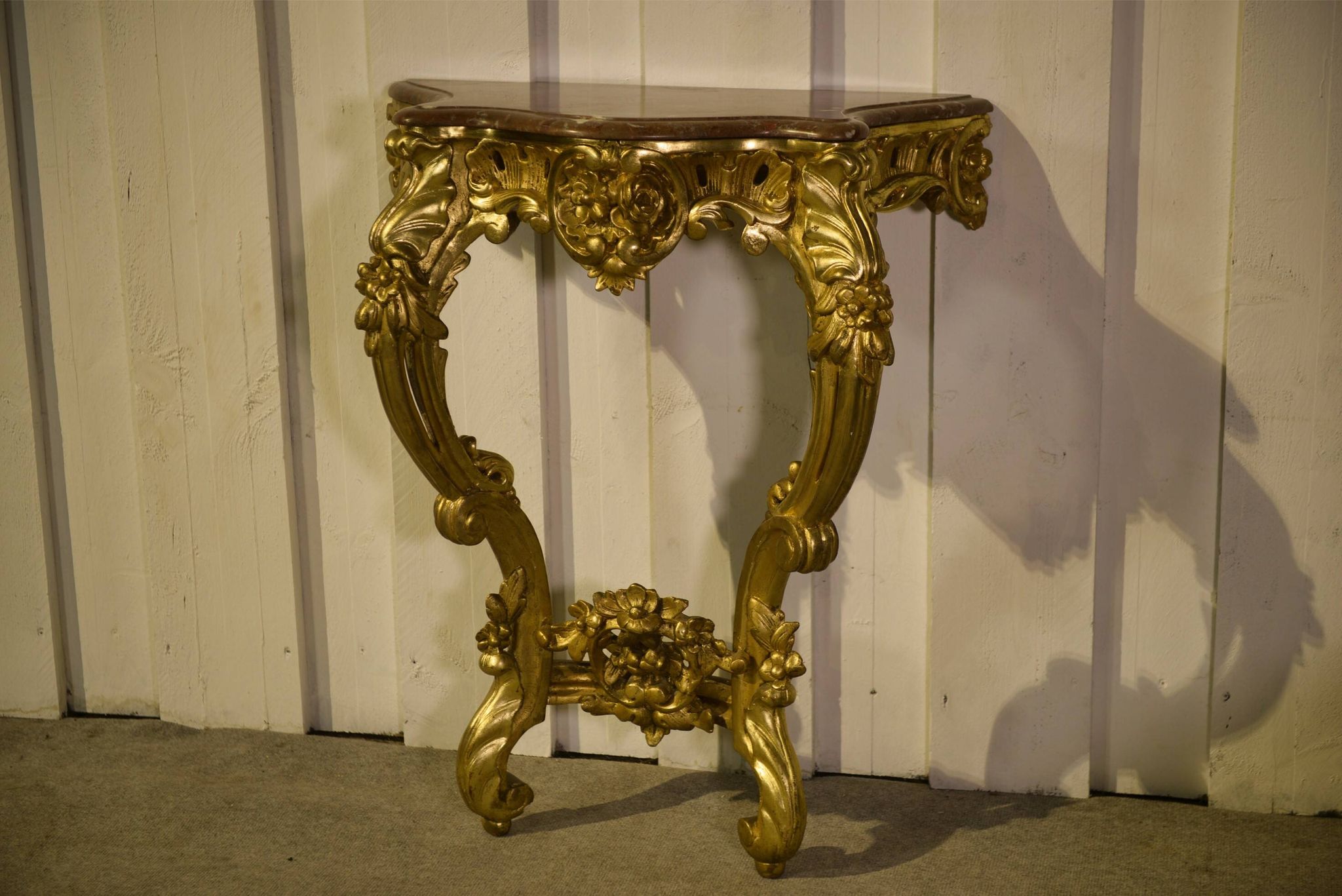 Golden wood and marble console, 19th century.