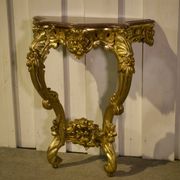 Golden wood and marble console, 19th century.