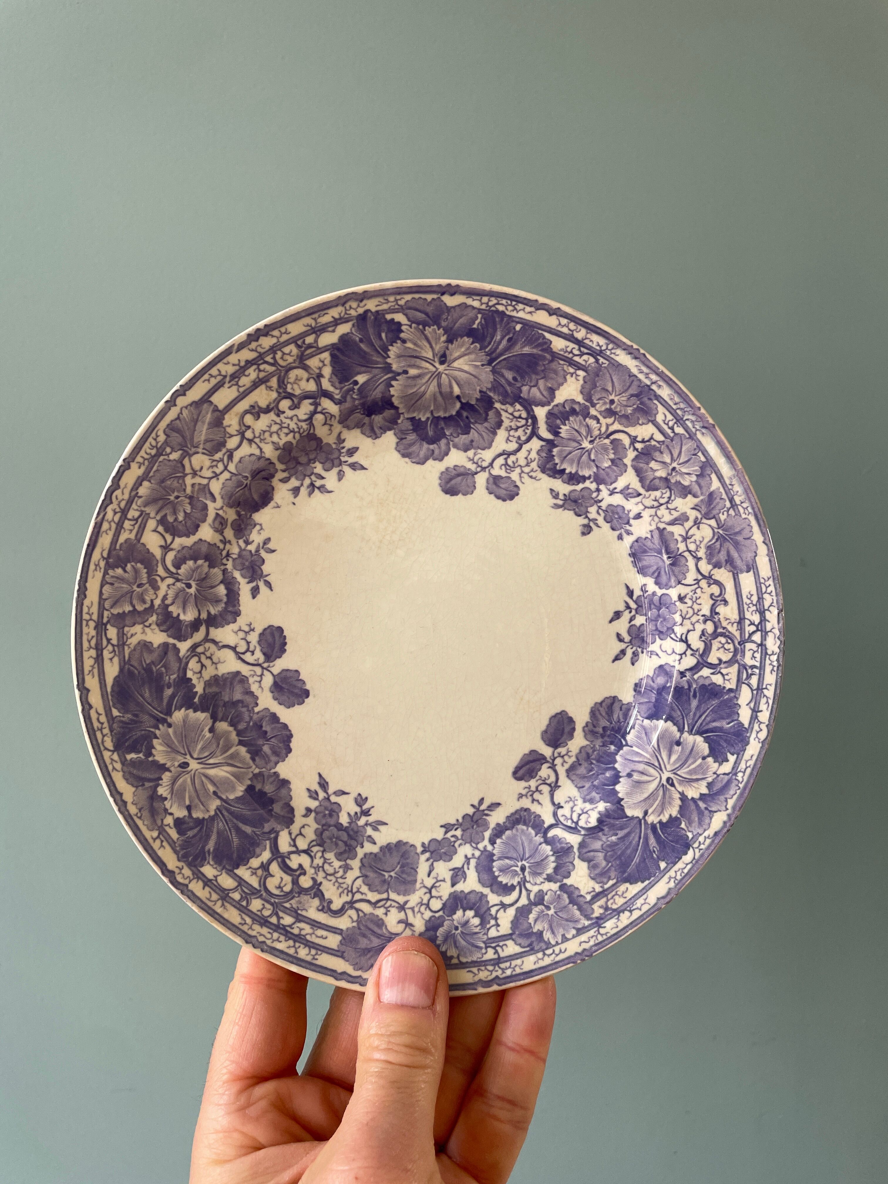 Series of 12 mismatched Terre de Fer dessert plates