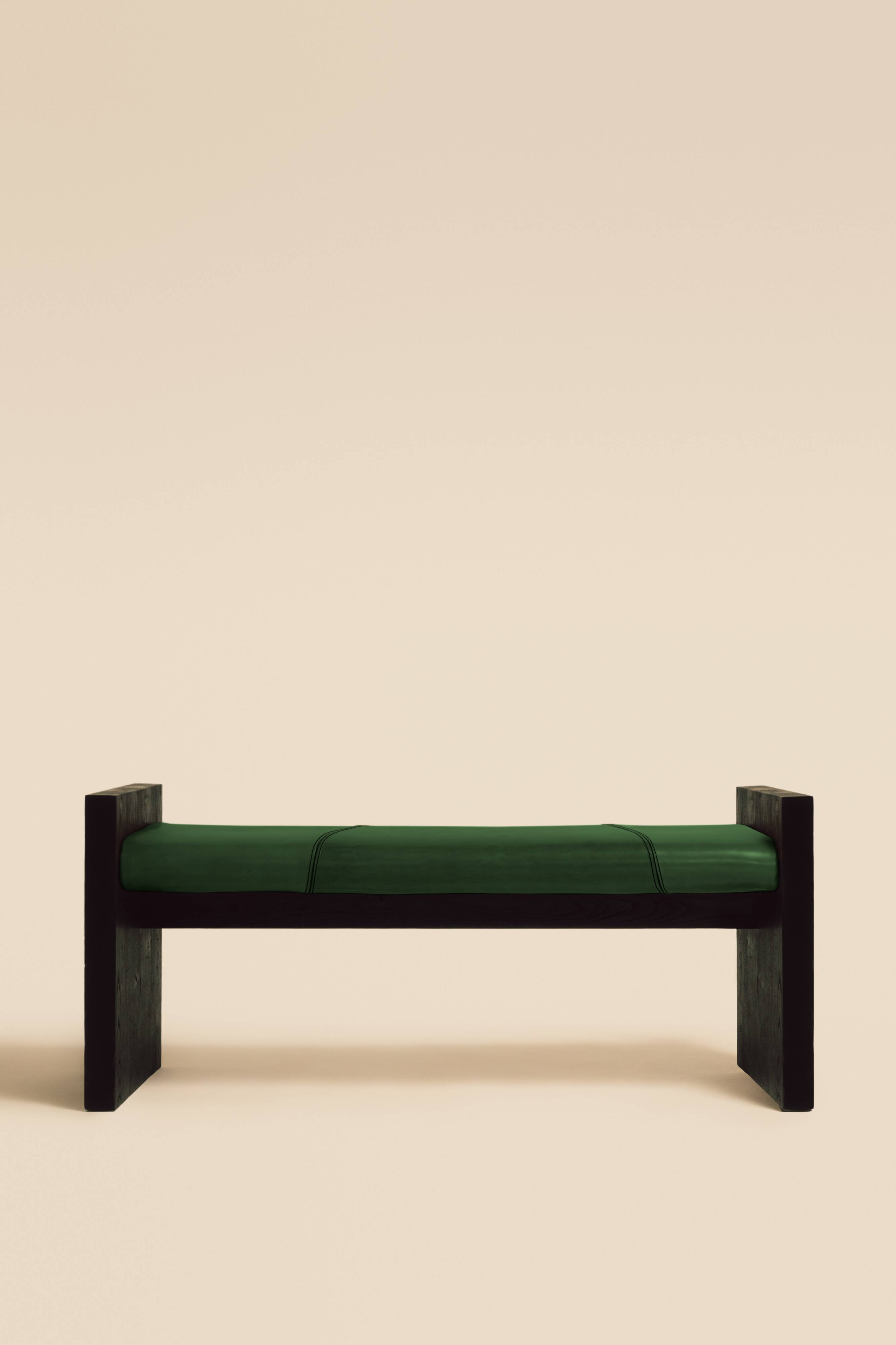 Maërl bench, sepia model, ebonized chestnut and green leather
