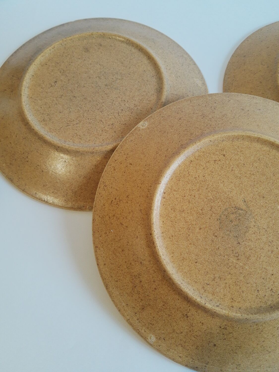 Trio of vintage Chantilly France stoneware dinner plates