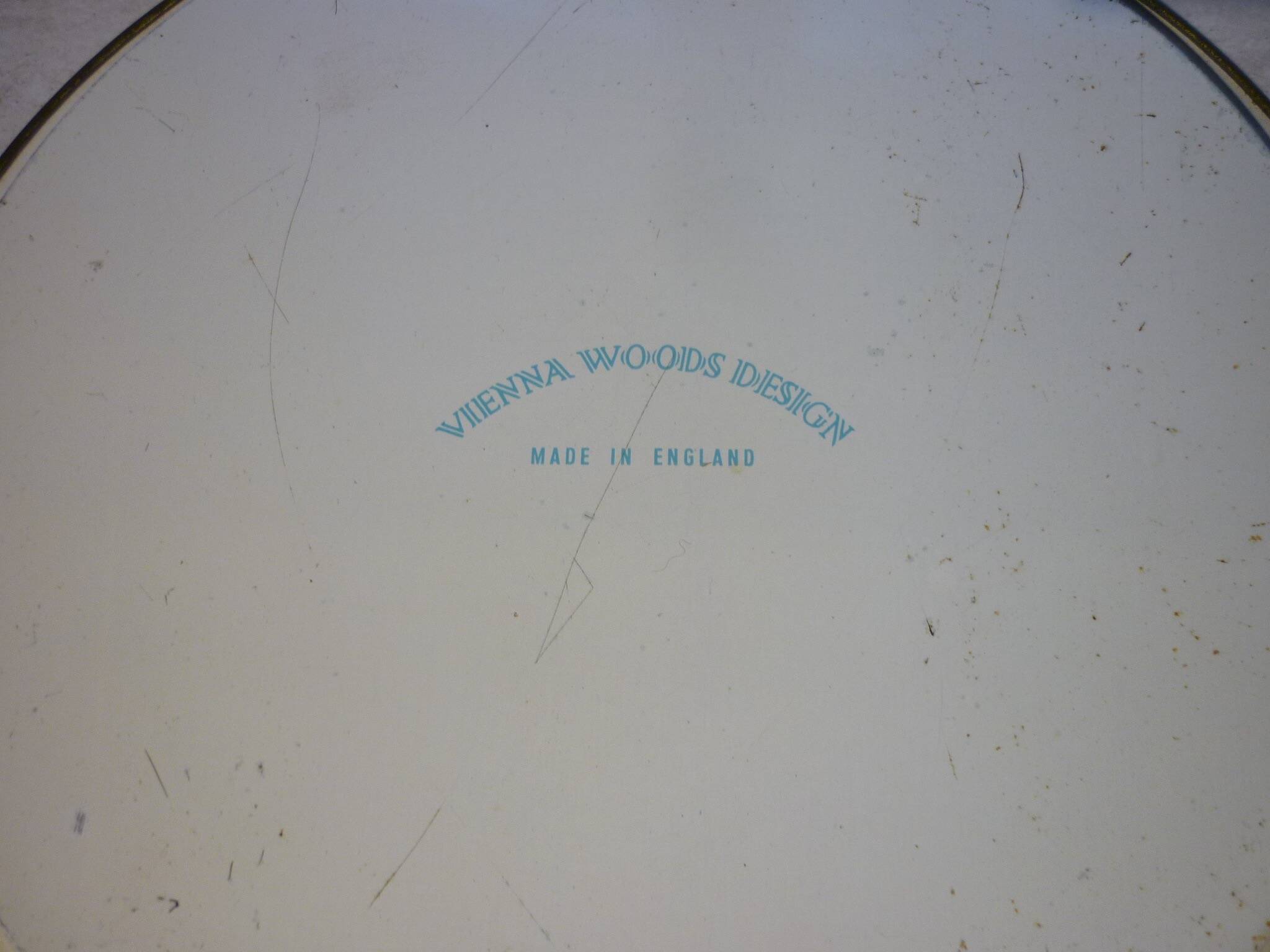 Blue cashmere round tray on white background.