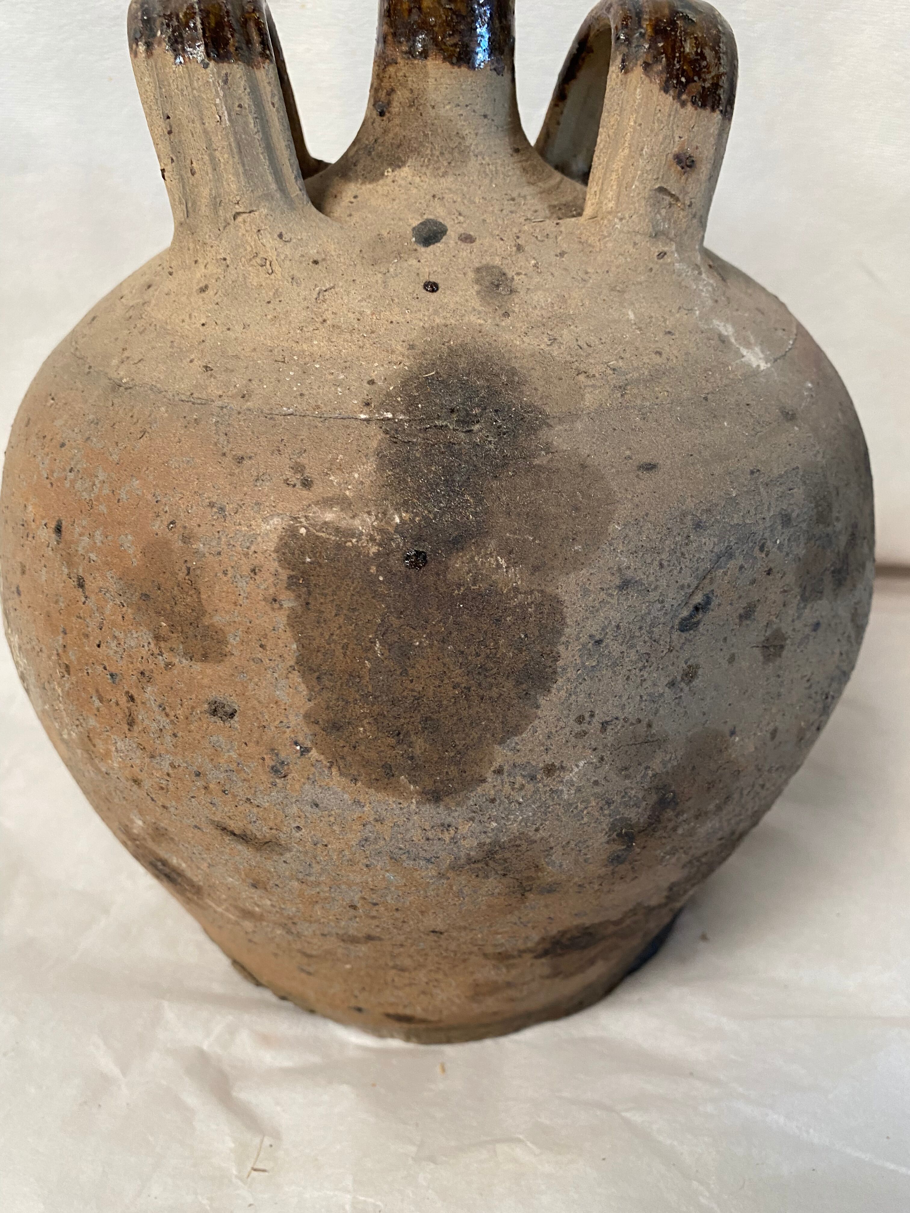 Vase jug in ancient sandstone